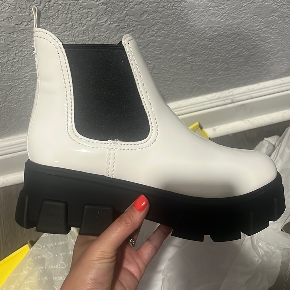 White and black boots